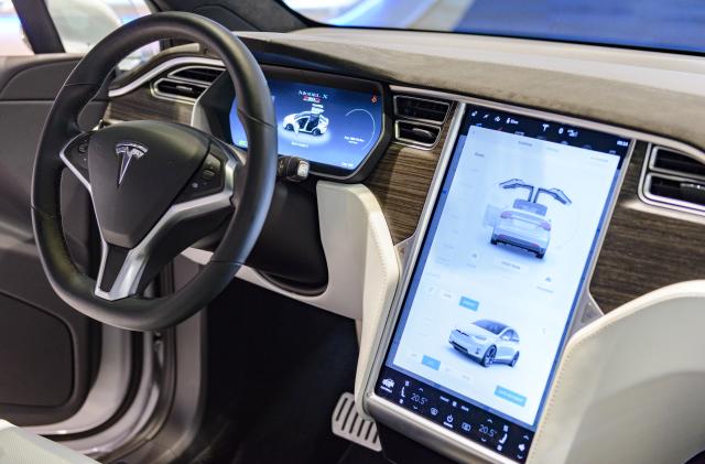BRUSSELS, BELGIUM - JANUARY 13:    Luxurious interior on a Tesla Model X P90D full electric luxury crossover SUV car with a large touch screen and dashboard screen on display at Brussels Expo on January 13, 2017 in Brussels, Belgium.  The Model X P90D is the highest performance version of the modelX and goes from 0 to 60 mph in 3.2 seconds outperforming the fastest SUVs and most sports cars. The Model X's all-wheel drive system uses two motors. (Photo by Sjoerd van der Wal/Getty Images)