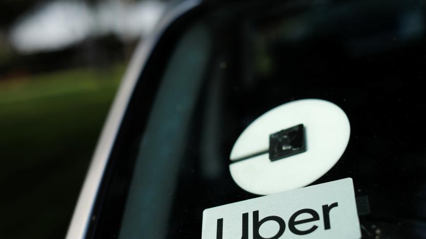 An Uber logo is shown on a rideshare vehicle during a statewide day of action to demand that ride-hailing companies Uber and Lyft follow California law and grant drivers "basic employee rights'', in Los Angeles, California, U.S., August 20, 2020. REUTERS/Mike Blake