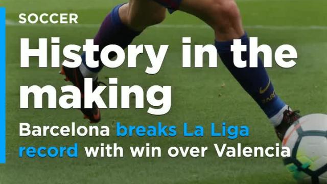 Barcelona beats Valencia, breaks La Liga record with unbeaten season in sight