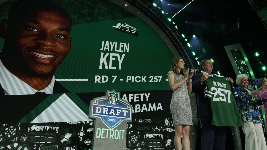 Associated Press - Melanie Salata Fitch announces Alabama's Jaylen Key as the final pick by the New York Jets during the third day of the NFL football draft, Saturday, April 27, 2024, in Detroit. The final pick is referred to as the Mr. Irrelevant pick. (AP Photo/Jeff Roberson)