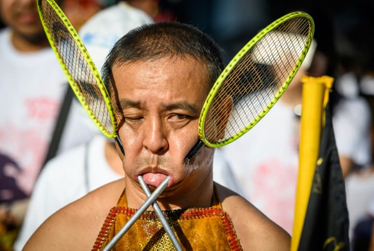 Mouthwatering Thai island hosts cheek piercing  veg festival