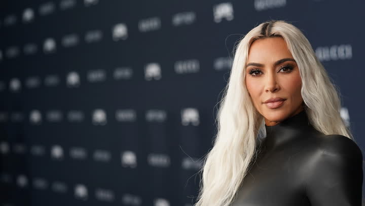 Kim Kardashian Wears 'Barbie' Chanel Necklace During Usher News Drop