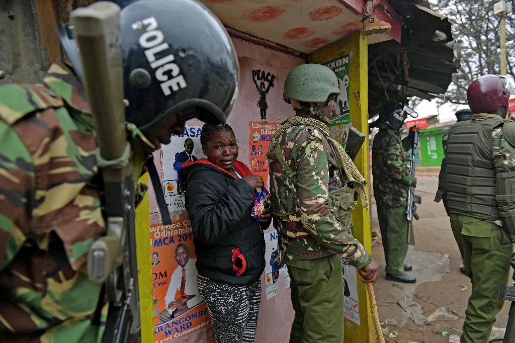 The turmoil provided a grim reminder of a disputed 2007 election which led to two months of ethno-political violence (AFP Photo/CARL DE SOUZA)