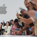 Apple up most in 18 months on upbeat forecast, buyback