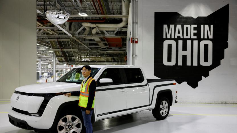 Jerry Hsiao, Chief Product Officer at Foxconn, poses for a photograph next to a finished Lordstown Motors Endurance electric pick-up truck on display at Foxconn's electric vehicle production facility in Lordstown, Ohio, U.S. November 30, 2022. REUTERS/Quinn Glabicki