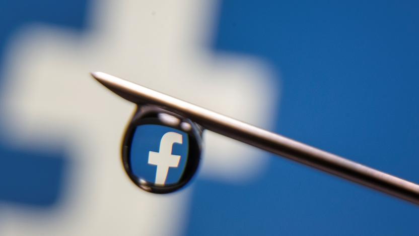 Facebook logo is reflected in a drop on a syringe needle in this illustration photo taken March 16, 2021. Picture taken March 16, 2021. REUTERS/Dado Ruvic/Illustration