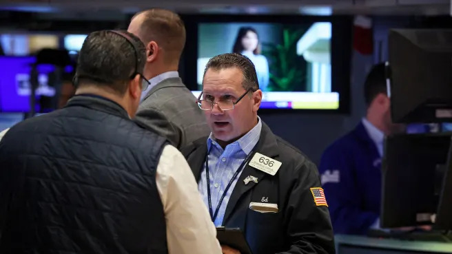 Stocks edge higher to start big week