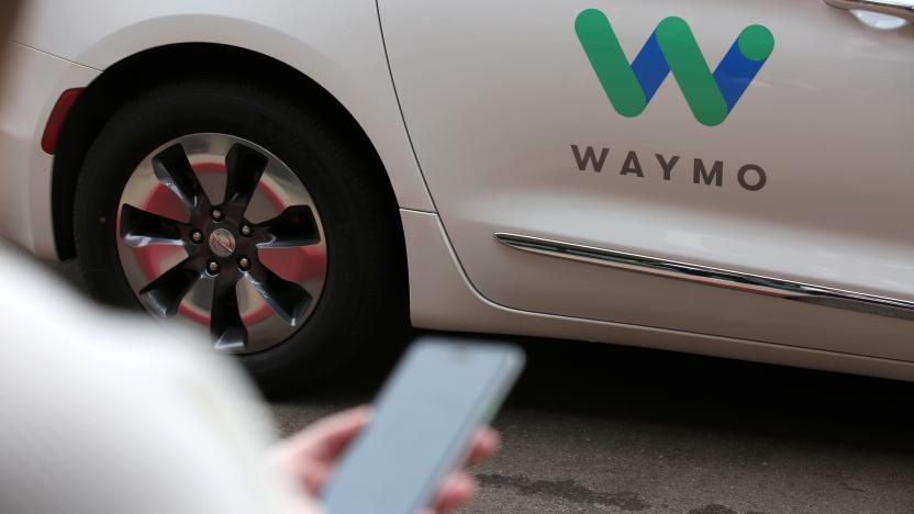 A Waymo employee hails a ride on their phone during a demonstration in Chandler, Arizona, November 29, 2018. Picture taken November 29, 2018. REUTERS/Caitlin O’Hara