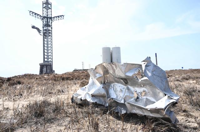 Debris litters the ground on April 22, 2023, after the SpaceX Starship liftedoff on April 20 for a flight test from Starbase in Boca Chica, Texas. - The rocket successfully blasted and the Starship capsule had been scheduled to separate from the first-stage rocket booster three minutes into the flight but separation failed to occur and the rocket blew up. 