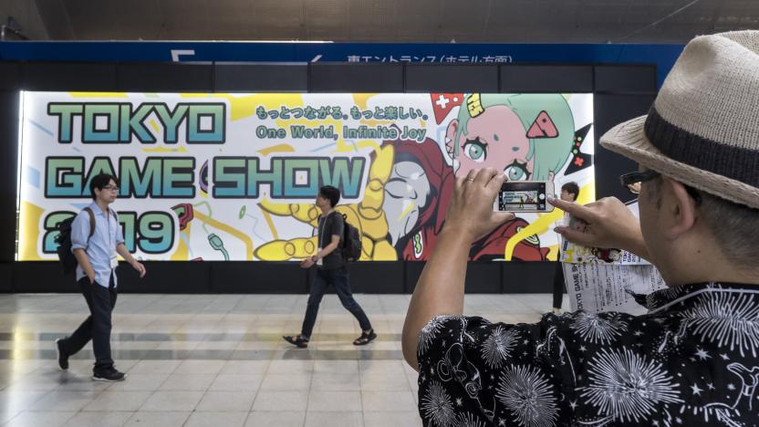 CHIBA, JAPAN - SEPTEMBER 12:  An attendee takes a photograph of signage of the Tokyo Game Show 2019 during the business day at Makuhari Messe on September 12, 2019 in Chiba, Japan. The Tokyo Game Show will be open to the public on September 14 and 15, 2019. (Photo by Tomohiro Ohsumi/Getty Images)