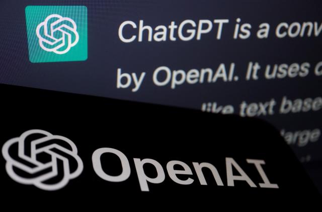 The logo of OpenAI is displayed near a response by its AI chatbot ChatGPT on its website, in this illustration picture taken February 9, 2023. REUTERS/Florence Lo/Illustration