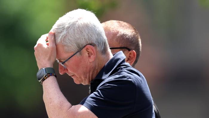 SUN VALLEY, IDAHO - JULY 13: Tim Cook, Apple CEO, walks from lunch during the Allen & Company Sun Valley Conference on July 13, 2023 in Sun Valley, Idaho. Every July, some of the world's most wealthy and powerful figures from the media, finance, technology and political spheres converge at the Sun Valley Resort for the exclusive weeklong conference. (Photo by Kevin Dietsch/Getty Images)