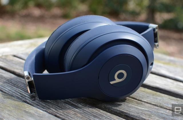 Blue Beats Studio3 headphones on a picnic table. 