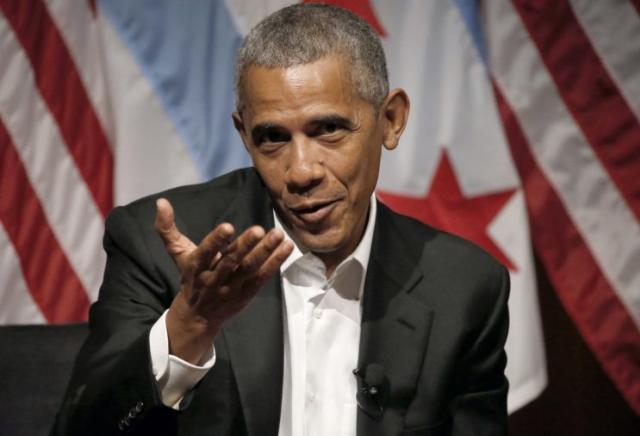 Obama leads a panel discussion at the the University of Chicago on Monday. (Charles Rex Arbogast/AP)