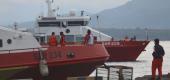 Members of National Search and Rescue Agency stand on a ship as it joins the search for submarine KRI Nanggala that went missing. (AP)