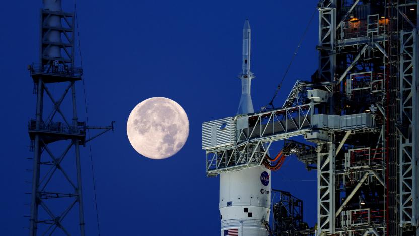 A full moon, known as the "Strawberry Moon" is shown with NASA’s next-generation moon rocket, the Space Launch System (SLS) Artemis 1, at the Kennedy Space Center in Cape Canaveral, Florida, U.S. June 15, 2022. REUTERS/Joe Skipper