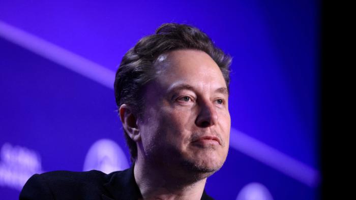 FILE PHOTO: Elon Musk, Chief Executive Officer of SpaceX and Tesla and owner of X looks on during the Milken Conference 2024 Global Conference Sessions at The Beverly Hilton in Beverly Hills, California, U.S., May 6, 2024.  REUTERS/David Swanson/File Photo