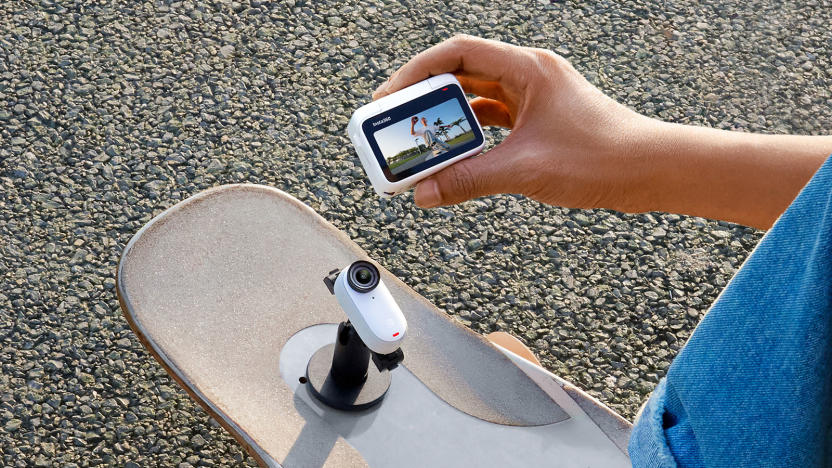 The Insta360 Go 3 with its thumb-sized camera detached from its 'Action Pod' body for remote viewing.