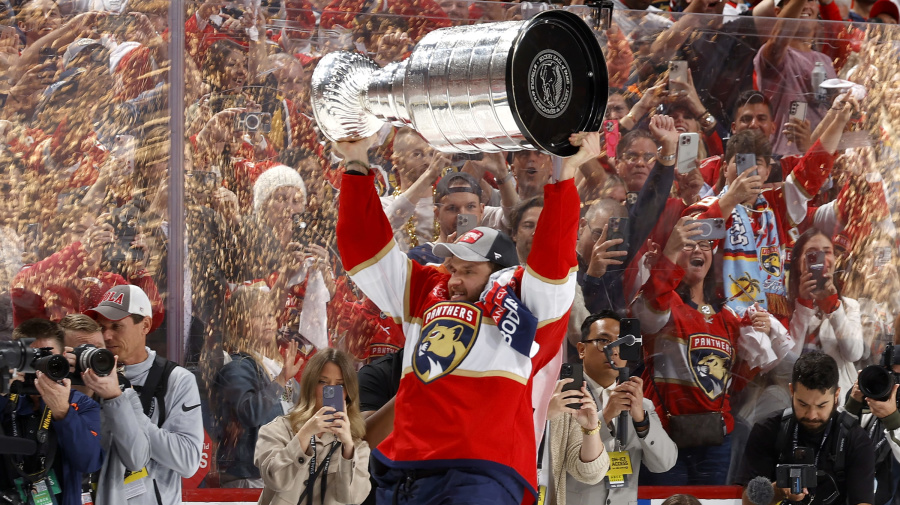 Getty Images - SUNRISE, FLORIDA - JUNE 24: Aleksander Barkov #16 of the Florida Panthers lifts the Stanley Cup after Florida's 2-1 victory against the Edmonton Oilers in Game Seven of the 2024 Stanley Cup Final at Amerant Bank Arena on June 24, 2024 in Sunrise, Florida. (Photo by Joel Auerbach/Getty Images)