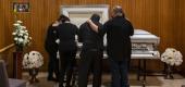 Family members gather to mourn Edith Fernandez on Dec. 20, 2020. (Brian van der Brug/Los Angeles Times/Getty Images)