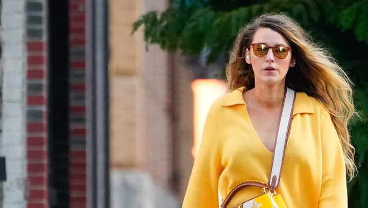 Blake Lively's Collared Yellow Sweater and Flared Jeans Are So '70s