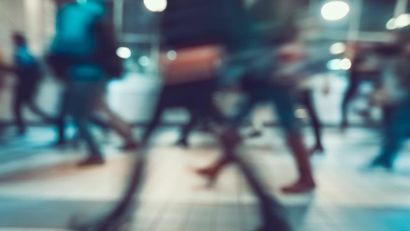 Blurred background. Pedestrians hurrying to transport