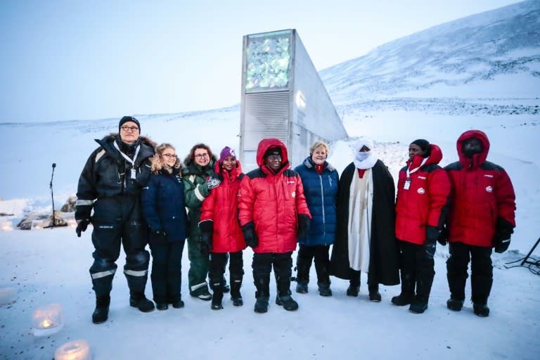 Norway's Prime Minister Erna Solberg, fourth from the right, and other representatives outside the vault (AFP Photo/Lise Åserud)