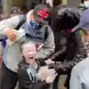 ‘I just don’t understand how any of them can sleep’: Parents of seven-year-old allegedly maced at Seattle protest speak out against police