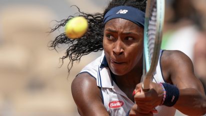 Reuters - Jun 4, 2024; Paris, France; Coco Gauff of the United States returns a shot during her match against Ons Jabeur of Tunisia on day 10 of Roland Garros at Stade Roland Garros. Mandatory Credit: Susan Mullane-USA TODAY Sports