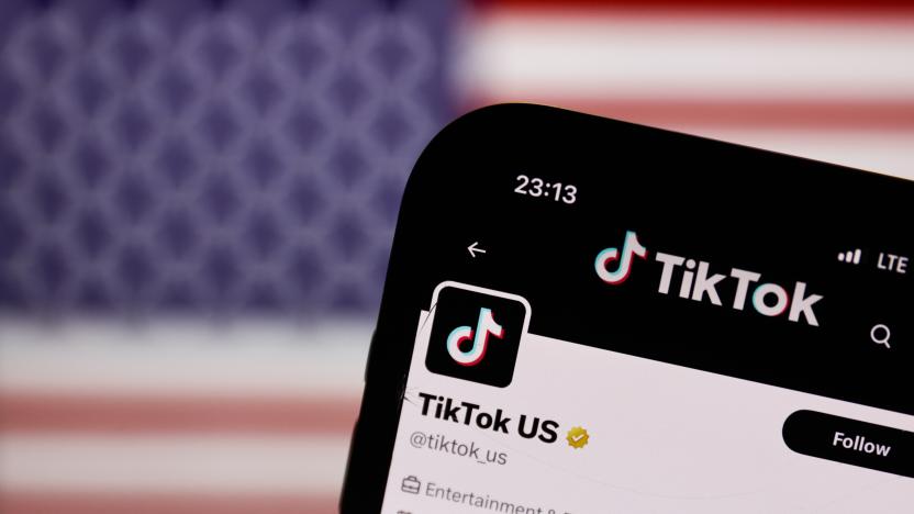 TikTok US account on X displayed on a phone screen is seen with American flag displayed on a screen in the background in this illustration photo taken in Krakow, Poland on April 24, 2024. (Photo by Jakub Porzycki/NurPhoto via Getty Images)