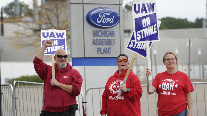 United Auto Workers members walk the picket line at the Ford Michigan Assembly Plant in Wayne, Mich., Tuesday, Sept. 26, 2023. (AP Photo/Paul Sancya)