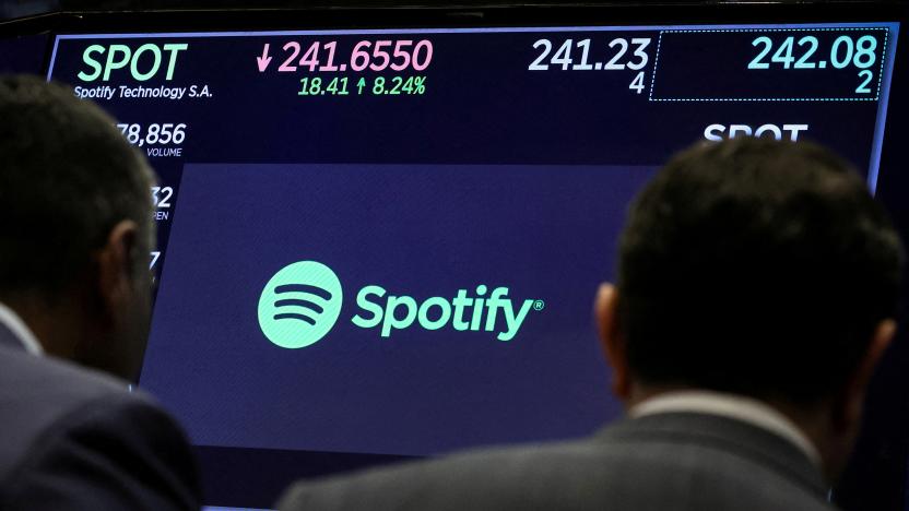 FILE PHOTO: A screen displays the logo and trading information for Spotify on the floor at the New York Stock Exchange (NYSE) in New York City, U.S., February 6, 2024.  REUTERS/Brendan McDermid/File Photo