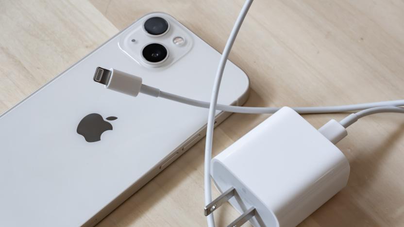 Bangkok, Thailand - January 17, 2022: An iPhone 13 with 20W power adapter and Lightning cable.