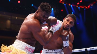 Getty Images - RIYADH, SAUDI ARABIA - MARCH 08: Anthony Joshua punches Francis Ngannou during the Heavyweight fight between Anthony Joshua and Francis Ngannou on the Knockout Chaos boxing card at the Kingdom Arena on March 08, 2024 in Riyadh, Saudi Arabia. (Photo by Richard Pelham/Getty Images)