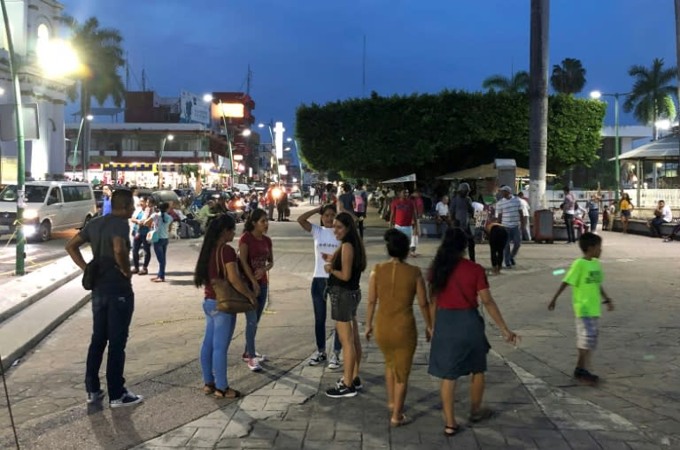 Migrants mingle in the Miguel Hidalgo park in Tapachula, Mexico, many wondering if their "American dream" may need to be modified (AFP Photo/ALFREDO ESTRELLA)