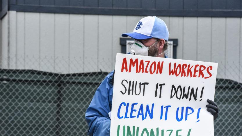 NEW YORK, NY - MAY 01: People protest working conditions outside of an Amazon warehouse fulfillment center on May 1, 2020 in the Staten Island borough of New York City. People attending the protest are concerned about Amazon's handling of the coronavirus and are demanding more safety precautions during the pandemic. (Photo by Stephanie Keith/Getty Images)