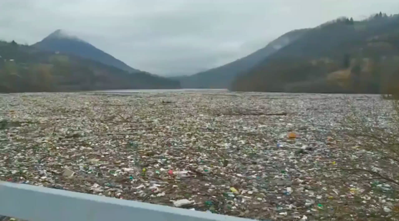 Shocking images show Serbian lake completely covered in rubbish