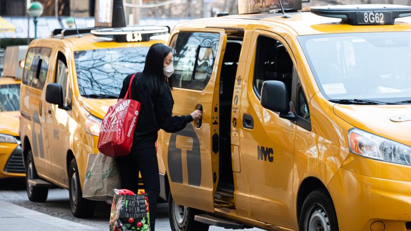 NEW YORK, NEW YORK - MARCH 09: A person enters a yellow cab on the Upper West Side amid the coronavirus pandemic on March 09, 2021 in New York City. It has been one year since COVID-19 was first reported in New York City. After undergoing various shutdown orders for the past 12 months, the city is currently in phase 4 of it's reopening plan, allowing for the reopening of low-risk outdoor activities, movie and television productions, indoor dining as well as the opening of movie theaters, all with capacity restrictions. (Photo by Noam Galai/Getty Images)