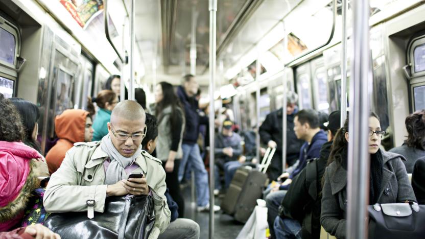 New York, USA - March 15, 2012: People traveling  in a busy subway train in New York city.