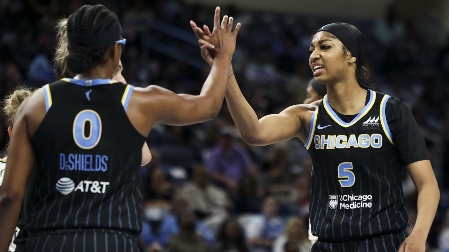 Getty Images - Chicago Sky forward Angel Reese (5) high-fives guard Diamond DeShields (0) during action against New York Liberty at Wintrust Arena on May 7, 2024, in Chicago. (Eileen T. Meslar/Chicago Tribune/Tribune News Service via Getty Images)
