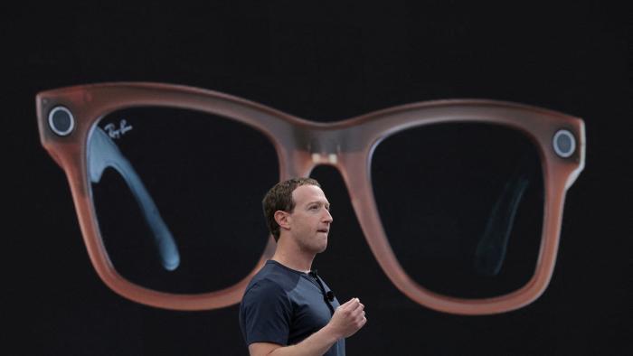 FILE PHOTO: Meta CEO Mark Zuckerberg delivers a speech, as a pair of Ray-Ban smart glasses appear on screen, during the Meta Connect event at the company's headquarters in Menlo Park, California, U.S., September 27, 2023. REUTERS/Carlos Barria/File Photo