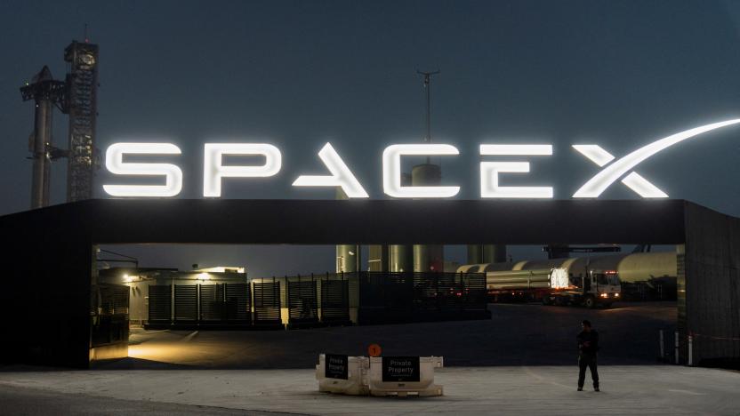 A security guard monitors the entrance as SpaceX's next-generation Starship spacecraft atop its powerful Super Heavy rocket is prepared for a third launch from the company's Boca Chica launchpad on an uncrewed test flight, near Brownsville, Texas, U.S. March 13, 2024. REUTERS/Cheney Orr