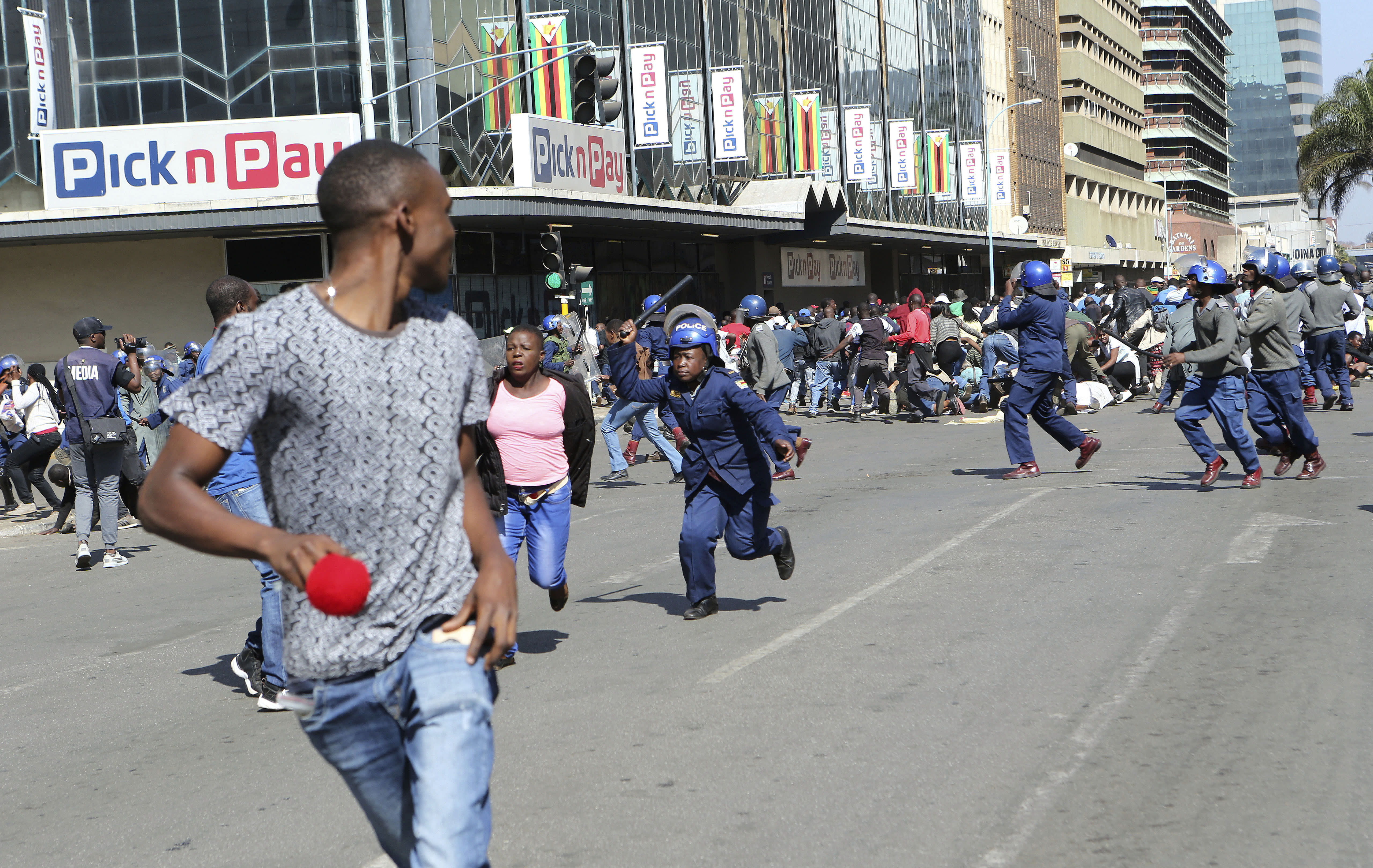 Zimbabwes Police Beat Anti Government Protesters In Capital 