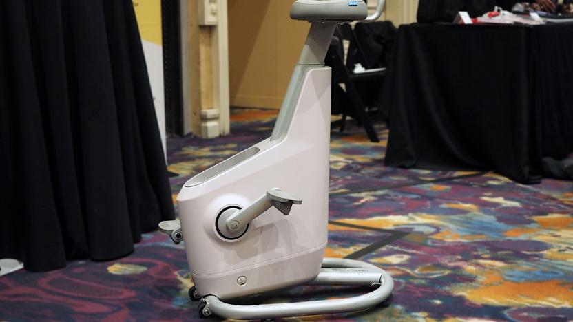 Image of the Lifespan Ampera Desk Bike on a brightly-colored carpet.