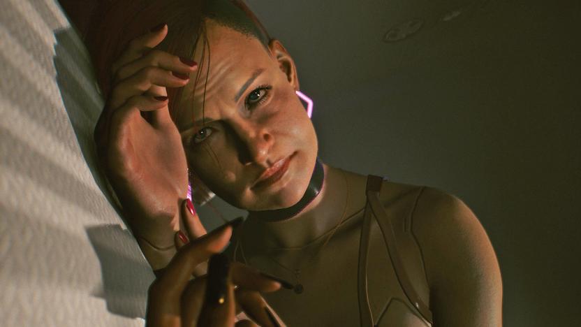 A screenshot taken from Cyberpunk 2077 video game showing a female laying on their side.