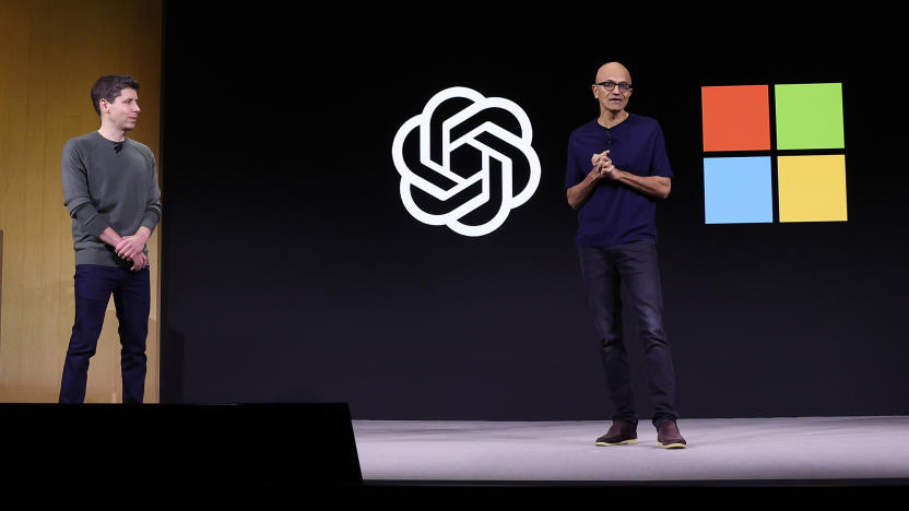 SAN FRANCISCO, CALIFORNIA - NOVEMBER 06: Microsoft CEO Satya Nadella (R) speaks as OpenAI CEO Sam Altman (L) looks on during the OpenAI DevDay event on November 06, 2023 in San Francisco, California. Altman delivered the keynote address at the first ever Open AI DevDay conference. (Photo by Justin Sullivan/Getty Images)