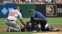 Ronald Acuña Jr. leaves the game with an injury