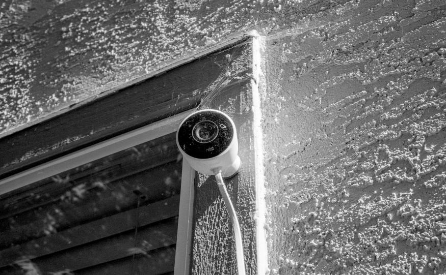 Nest surveillance camera from Google installed on the exterior of a suburban home atop a window in San Ramon, California, August 11, 2020. (Photo by Smith Collection/Gado/Getty Images)