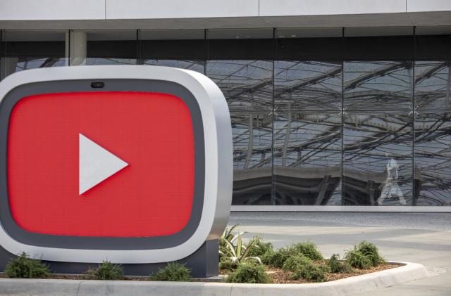 Inglewood, CA - July 23 SoFi Stadium is reflected in the glass exterior of the new YouTube Theater, a 6,000 seat performance venue that is part of a larger complex called Hollywood Park on Friday, July 23, 2021 in Inglewood, CA. (Brian van der Brug / Los Angeles Times via Getty Images)