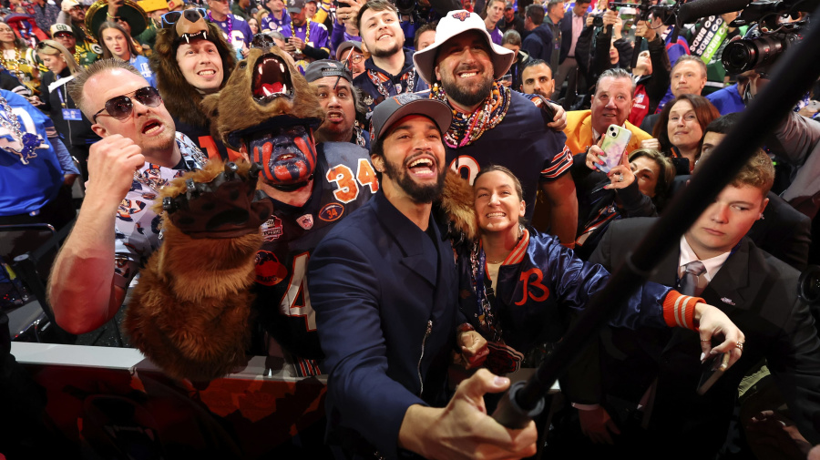 Associated Press - Southern California Quarterback Caleb Williams celebrates after being chosen by the Chicago Bears with the first overall pick during the first round of the NFL football draft, Thursday, April 25, 2024 in Detroit. (Jeff Lewis/AP Images for the NFL)